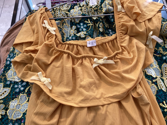 Yellow ruffle top used